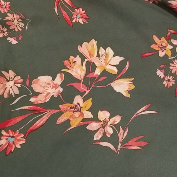 **Never Worn**Romper/ jumpsuit - Picture 2 of 3